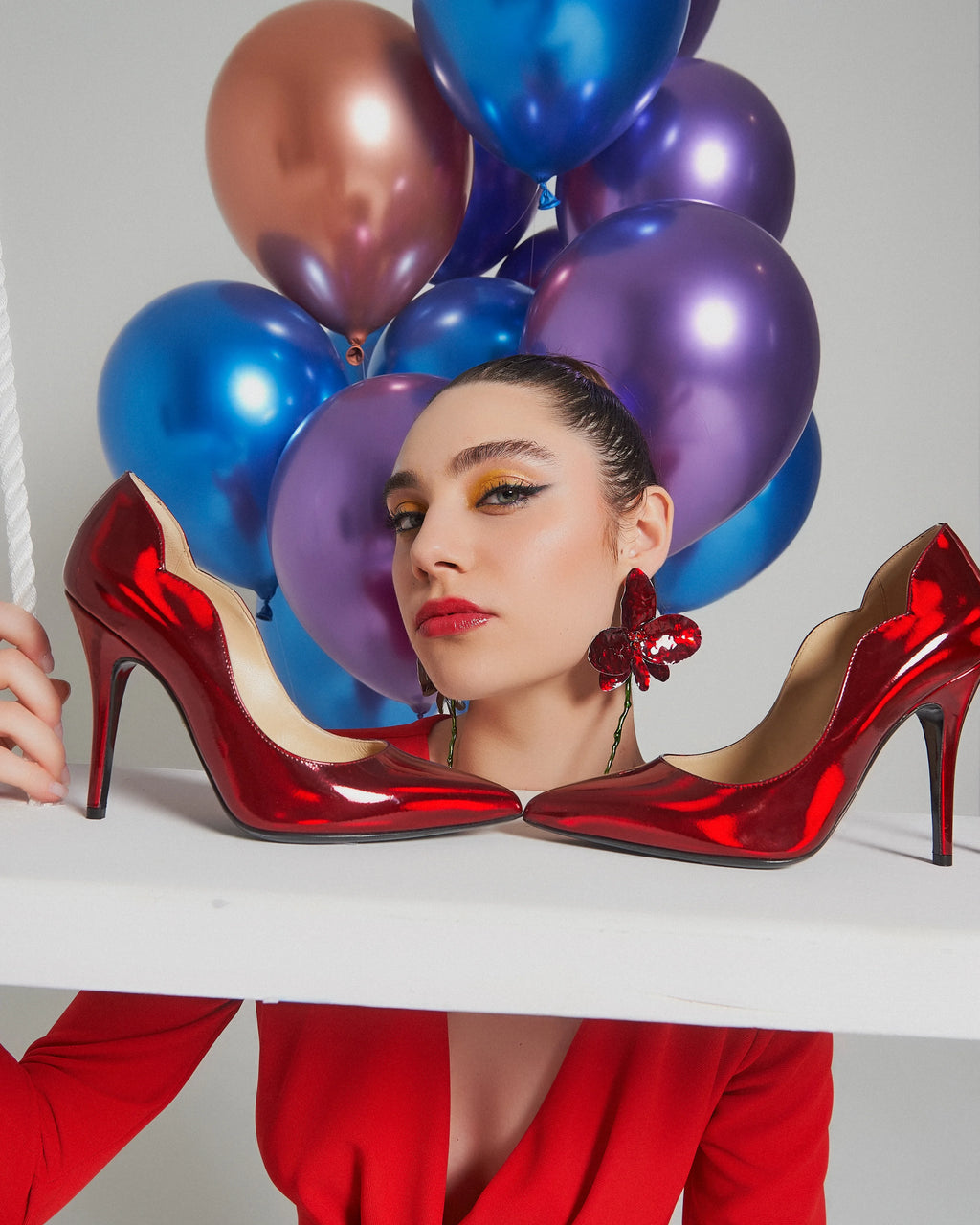 Décolleté rosso specchio